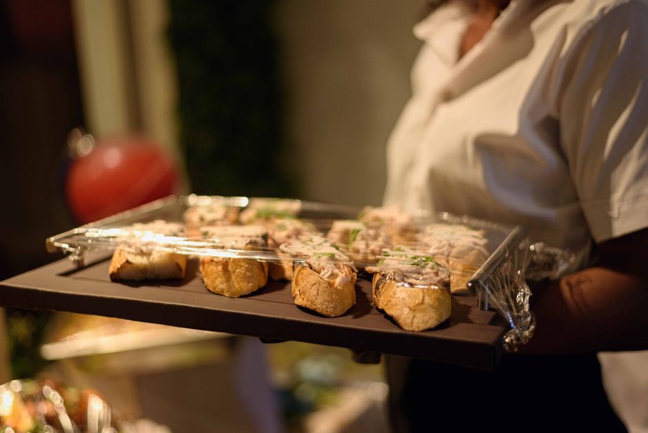 Tray of fresh appetizers served by a waiter during an event in Enugu, Nigeria.